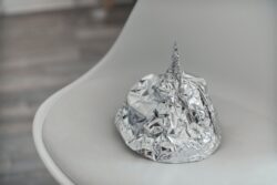 Tin foil hat on a chair