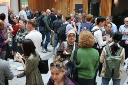Delegates chatting in hall foyer